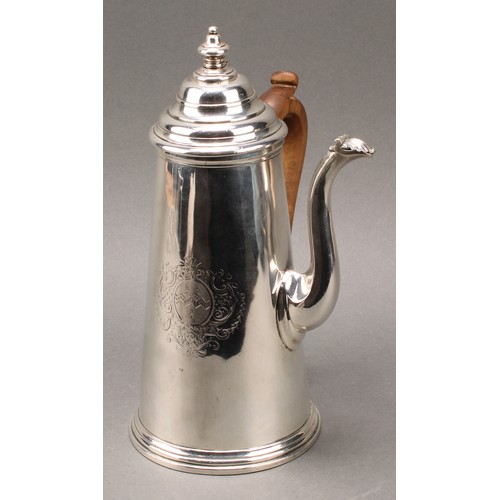 162 - A Queen Anne silver conical side handled chocolate pot, hinged cover with stirring aperture, S-shape... 