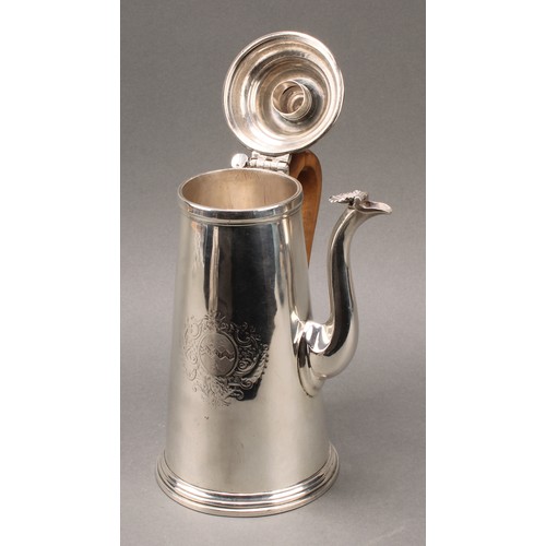 162 - A Queen Anne silver conical side handled chocolate pot, hinged cover with stirring aperture, S-shape... 