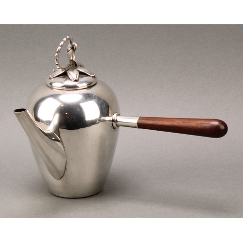 145 - A Mexican Arts and Crafts silver side-handled cafe au lait pot, in the manner of Georg Jensen, bud f... 