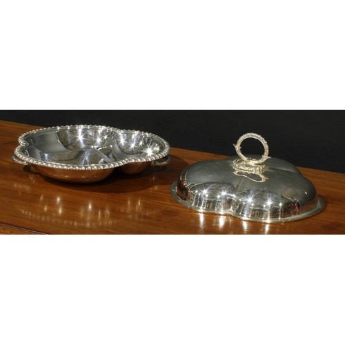 58 - An unusual E.P.N.S quatrefoil entree dish and cover, egg-and-dart border, rustic branch loop handle,... 