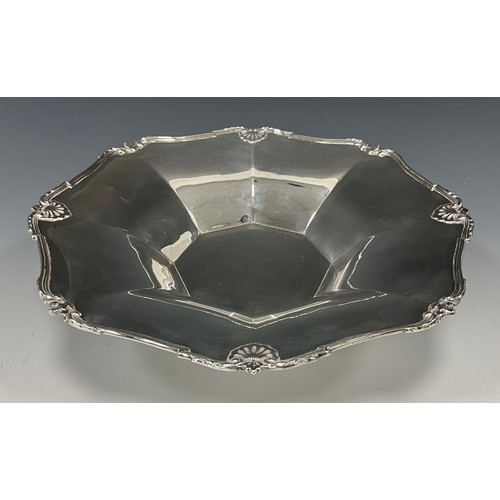 415 - A silver inverted octagonal fruit bowl, shell and scroll lip, Addie Brothers, Birmingham 1930, scrol... 