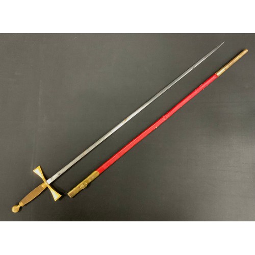 1768 - A Masonic sword, brass hilt, plain steel blade, red leather scabbard, 84cm long