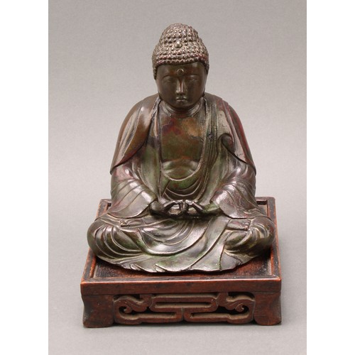 1400 - Chinese School (18th/19th century), a patinated bronze, Buddha, seated in meditation, 17cm high, pie... 