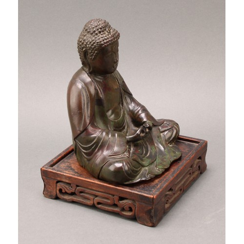 1400 - Chinese School (18th/19th century), a patinated bronze, Buddha, seated in meditation, 17cm high, pie... 