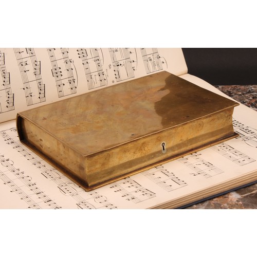 1511 - A 19th century brass novelty writing companion box, as a book, hinged cover enclosing a fitted compa... 