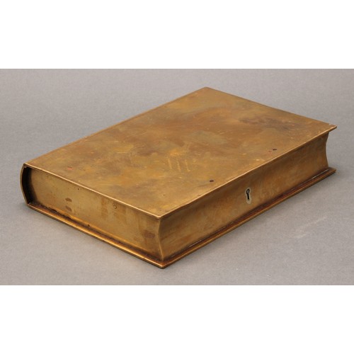 1511 - A 19th century brass novelty writing companion box, as a book, hinged cover enclosing a fitted compa... 