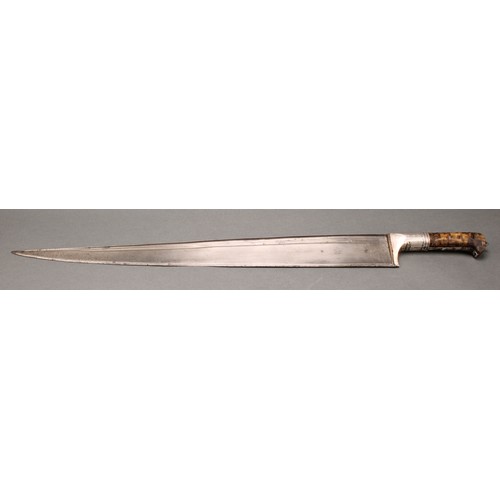 1767 - A 19th century Afghan Khyber knife, 56.5cm tapered single-edged fullered blade with broad spine, two... 