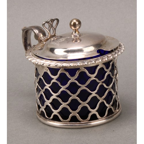 120 - A George III Irish silver mustard, hinged domed cover, with ball finial, gadrooned rim, pierced side... 