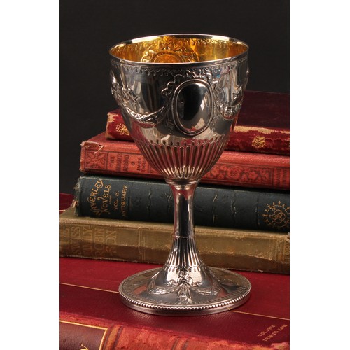 182 - Hester Bateman - a George III silver pedestal goblet, chased in the Neo-Classical taste with ribbon-... 