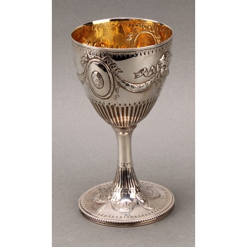 182 - Hester Bateman - a George III silver pedestal goblet, chased in the Neo-Classical taste with ribbon-... 