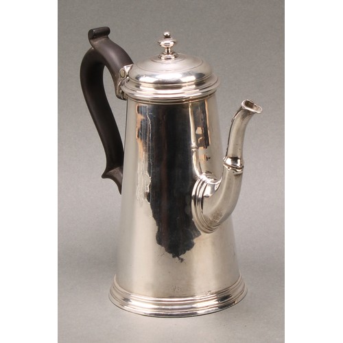 117 - A George II spreading cylindrical coffee pot, hinged cover with knop finial, skirted base, fruitwood... 