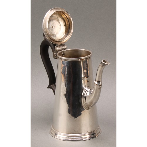 117 - A George II spreading cylindrical coffee pot, hinged cover with knop finial, skirted base, fruitwood... 