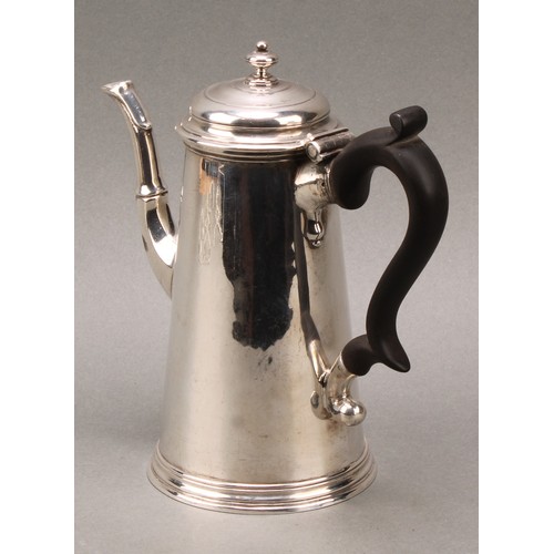 117 - A George II spreading cylindrical coffee pot, hinged cover with knop finial, skirted base, fruitwood... 