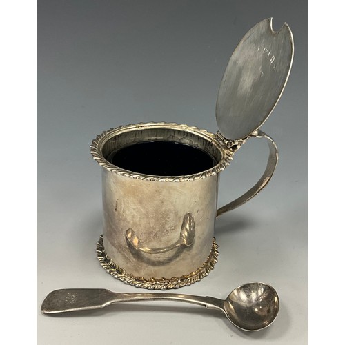 69 - A George III silver drum mustard pot and associated spoon, Bristol blue glass insert, indistinct Lon... 