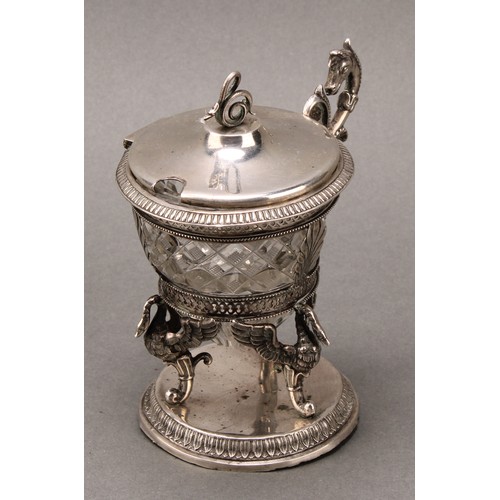 258 - A French Empire silver mustard, serpent finial, hinged cover, bifurcated scroll handle crested by a ... 