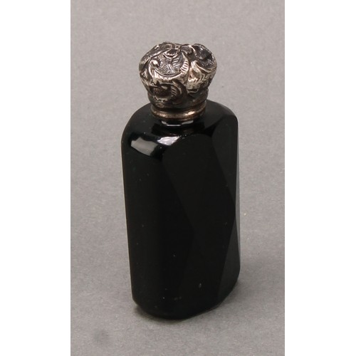 113 - A 19th century silver coloured metal mounted scent bottle, screw-fitting cover chased with a flowerh... 