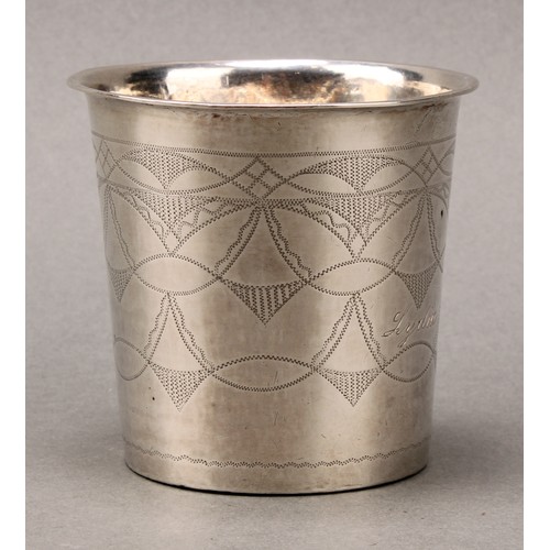 205 - A Scandinavian silver slightly tapered cylindrical beaker, engraved with wrigglework, 7.5cm high, 19... 