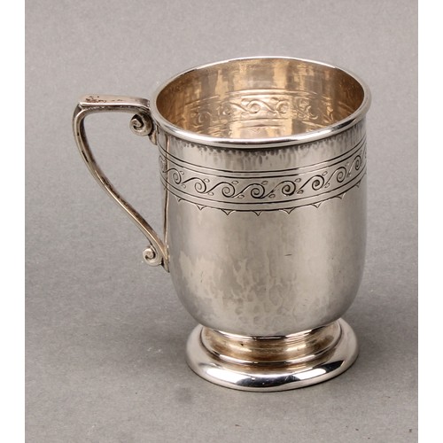 187 - Liberty & Co - an Arts and Crafts silver mug, engraved with a band of stylised Vitruvian scrolls, on... 