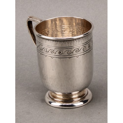 187 - Liberty & Co - an Arts and Crafts silver mug, engraved with a band of stylised Vitruvian scrolls, on... 