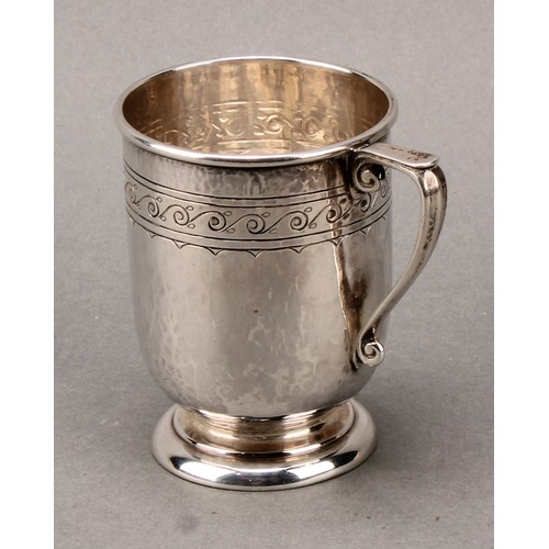 187 - Liberty & Co - an Arts and Crafts silver mug, engraved with a band of stylised Vitruvian scrolls, on... 