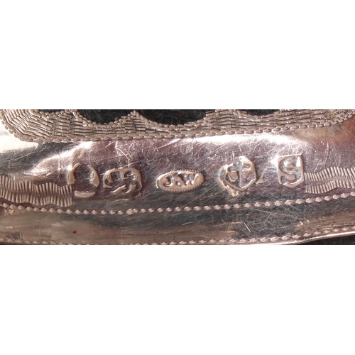 63 - A George III silver caddy spoon, rounded rectangular bowl engraved with wrigglework, 8cm long, Josep... 