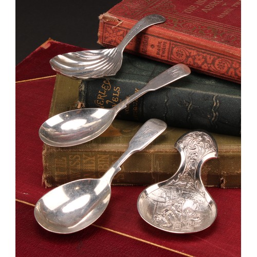 315 - A Victorian silver Fiddle pattern caddy spoon, 10cm long, Henry Holland, London 1856; others, variou... 