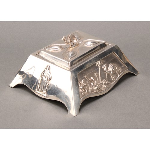 289 - An unusual silver table box, the angular sides embossed with various panels, Nile scene with palm tr... 