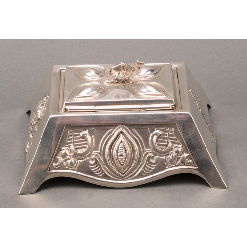 289 - An unusual silver table box, the angular sides embossed with various panels, Nile scene with palm tr... 