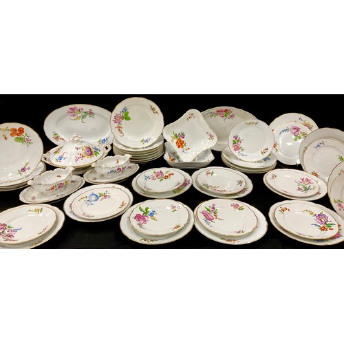 1202 - A early 20th century Dresden dinner service for six, decorated with hand painted flowers including; ... 