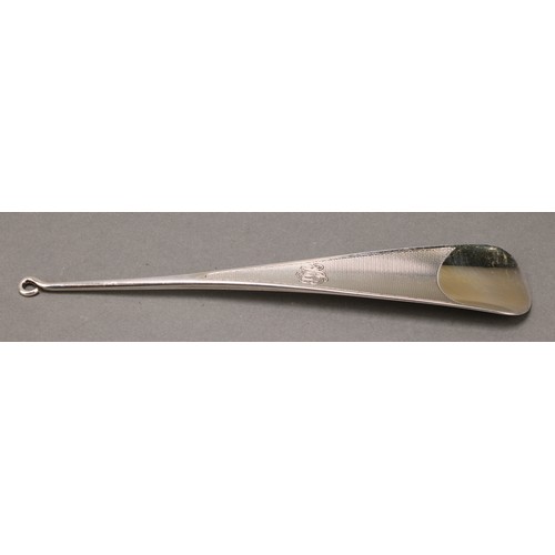 291 - Asprey - a George V silver shoe horn, engine turned, button hook terminal, 23cm long, London 1929, 9... 