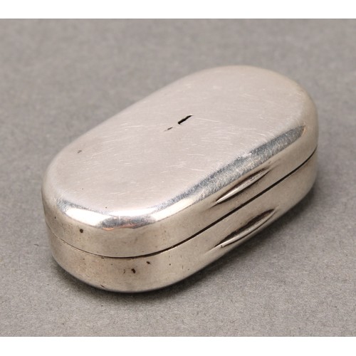 135 - A George III silver rounded rectangular vinaigrette, quite plain, hinged cover enclosing a pierced g... 