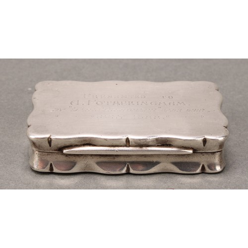 80 - A George V silver shaped rectangular snuff box, hinged cover inscribed 'Presented to A Fotheringham ... 