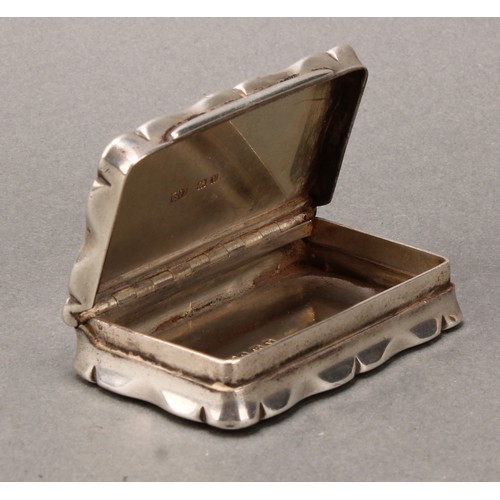 80 - A George V silver shaped rectangular snuff box, hinged cover inscribed 'Presented to A Fotheringham ... 