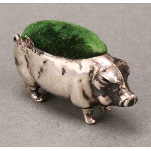 328 - An Edwardian silver novelty pin cushion, as a pig, 5.5cm long, Birmingham 1909