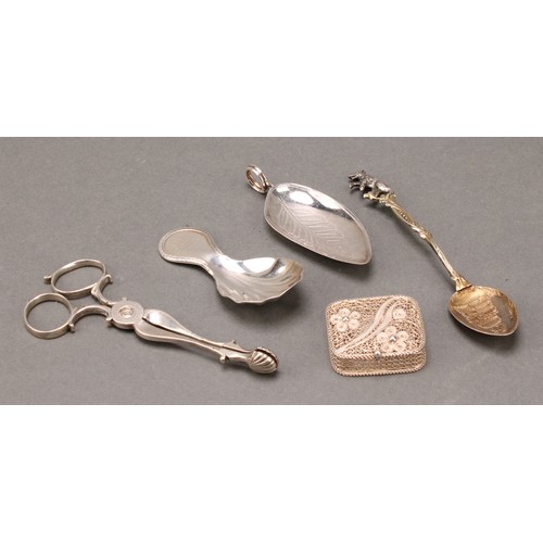 350 - A George III style leaf shaped caddy spoon, 8.5cm long, London 1978; another; a pair of 18th century... 