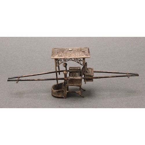 251 - A Chinese silver miniature model, of a sedan chair, 12.5cm long, character mark, 20g