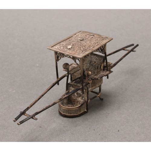 251 - A Chinese silver miniature model, of a sedan chair, 12.5cm long, character mark, 20g