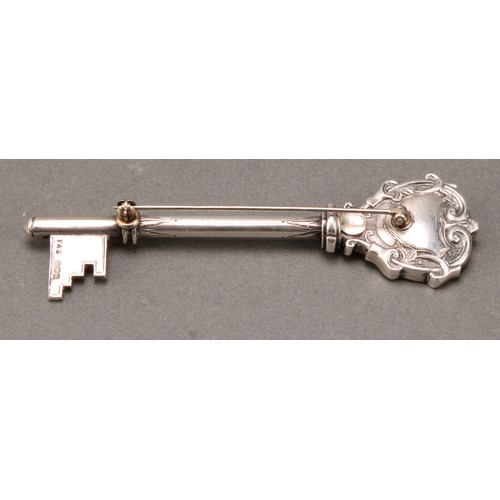 176 - Copoclephily - a George V silver presentation key, 10cm long, Birmingham 1923, mounted as a brooch, ... 