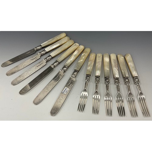 403 - A set of six Victorian silver mother of pearl handled dessert knives and forks, grape vine blades an... 