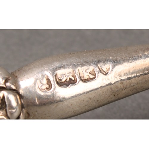 397 - A set of four George IV silver knife rests, lyre-form end supports, 8cm long, London 1826, 182g