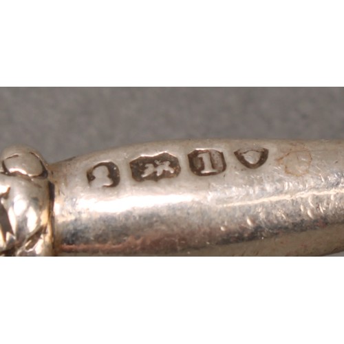 397 - A set of four George IV silver knife rests, lyre-form end supports, 8cm long, London 1826, 182g