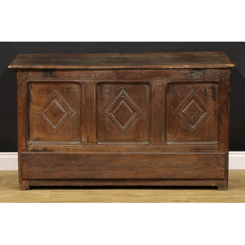 1896 - A George III oak mule chest, hinged top above a three panel front and two short drawers, 79cm high, ... 