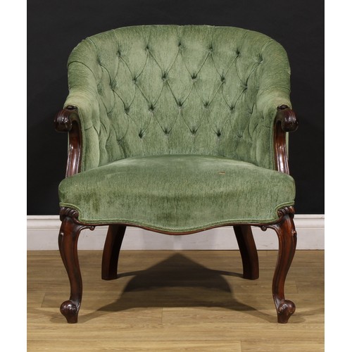 1699 - A Victorian mahogany library or sitting room chair, of broad proportions, stuffed-over upholstery, s... 