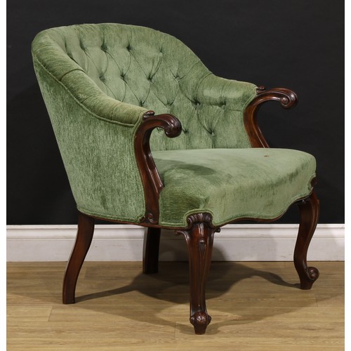 1699 - A Victorian mahogany library or sitting room chair, of broad proportions, stuffed-over upholstery, s... 