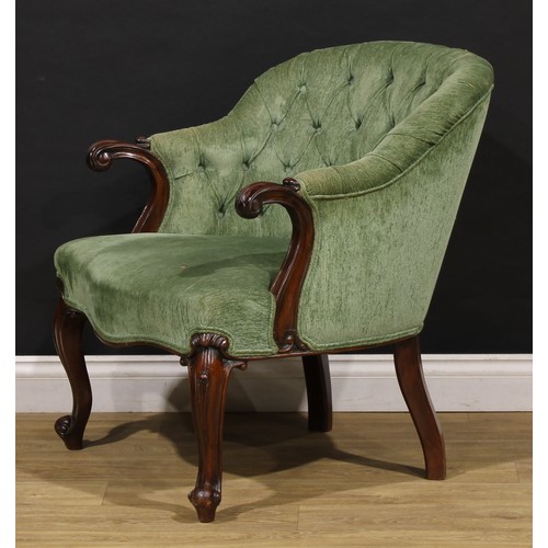 1699 - A Victorian mahogany library or sitting room chair, of broad proportions, stuffed-over upholstery, s... 