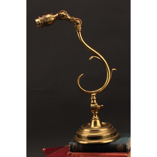 2006 - An Art Nouveau brass adjustable table lamp, in the manner of W A S Benson, articulated at the socle,... 