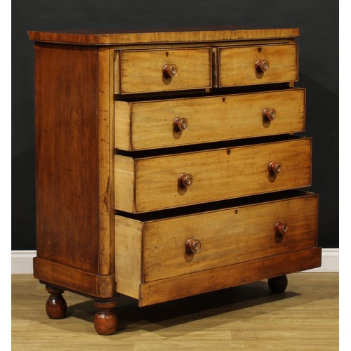 1785 - A Victorian mahogany chest, of two short and three long graduated cockbeaded drawers, turned handles... 