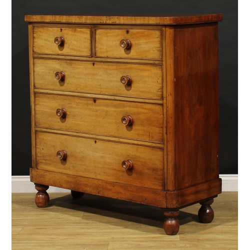 1785 - A Victorian mahogany chest, of two short and three long graduated cockbeaded drawers, turned handles... 