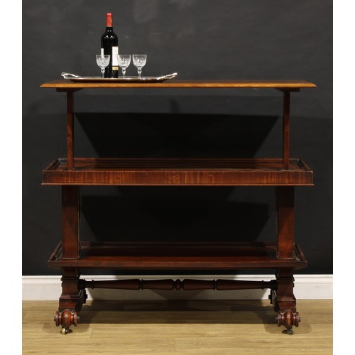 1632 - An early Victorian mahogany metamorphic buffet serving table, rectangular top above two further plat... 