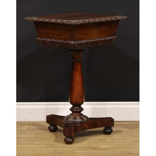 1905 - A George/William IV rosewood teapoy, hinged cover enclosing a caddy fitted interior, baluster column... 